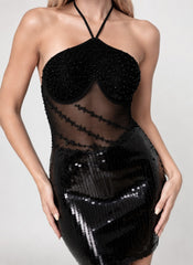 Robe courte moulante noire à dos-nu, col tour de cou, jupe pailletée brillante et empiècement en tulle, robe cristalline Dressie Dress.
