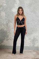 Ensemble 2 pièces Femme top dos-nu décolleté profond orné d’anneaux + pantalon taille basse évasé - tissu extensible gainant | Dressie Dress