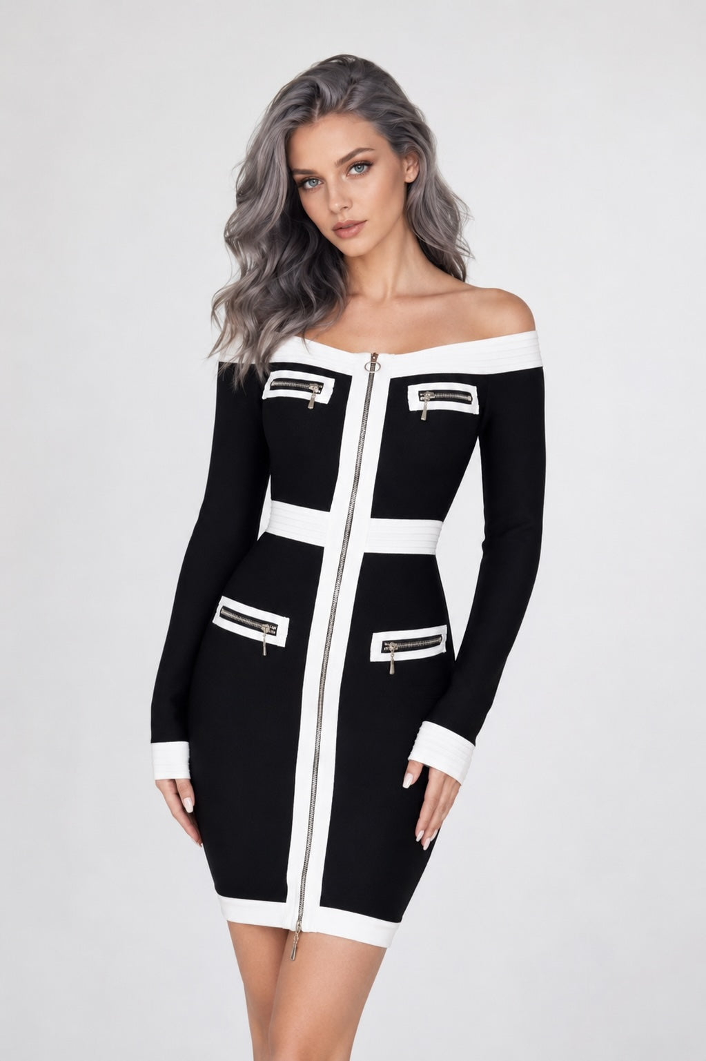 Robe bandage courte noire Dressie Dress à épaules dénudées, zip central et empiècements contrastés avec fausses poches zippées.