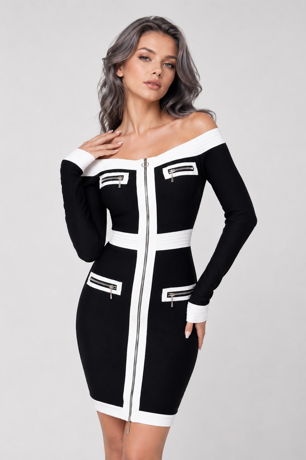 Robe bandage courte noire Dressie Dress à épaules dénudées, zip central, empiècements contrastés et fausses poches zippées.