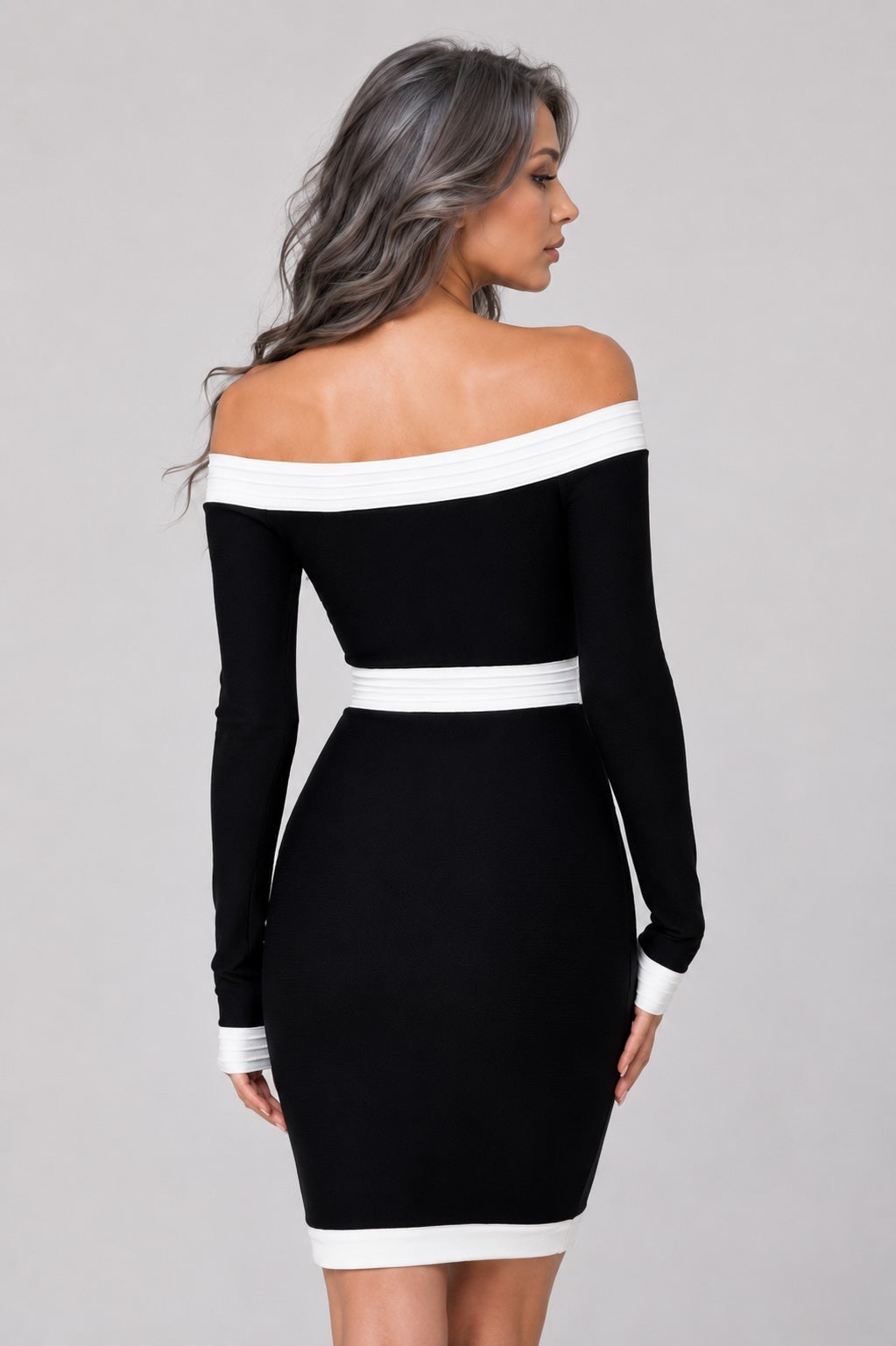 Robe courte bandage noire Dressie Dress à épaules dénudées, zip central et empiècements contrastés avec fausses poches zippées.
