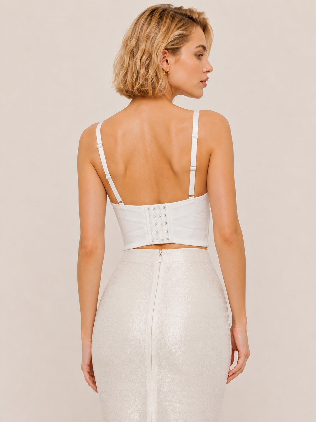 Top bustier pour femme de Dressie Dress avec perles, strass et franges scintillantes, style sexy et glamour.