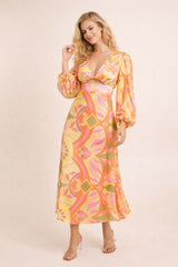 Robe longue imprimée pour femme avec décolleté profond, manches bouffantes et taille haute, de marque Dressie Dress.